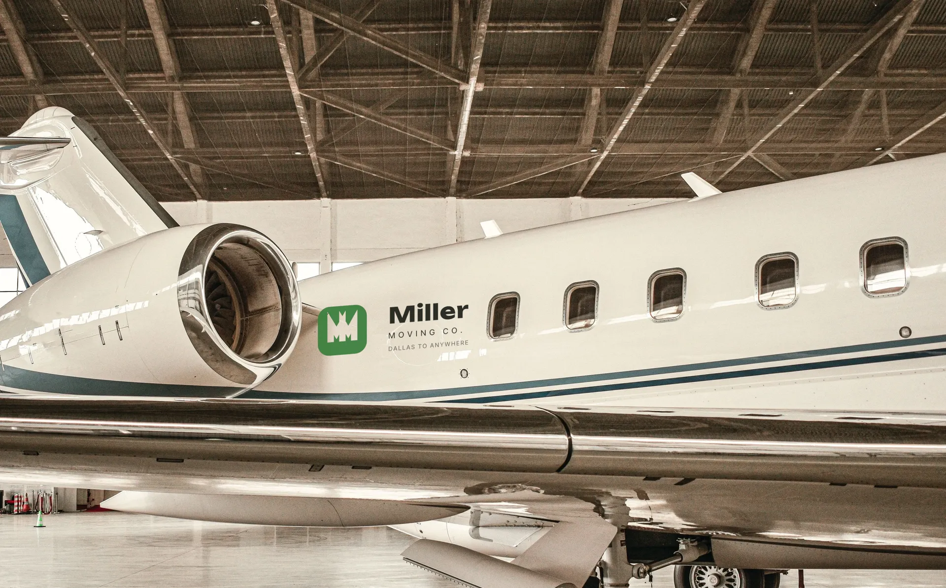 Miller Moving Co. logo on private jet in the hangar