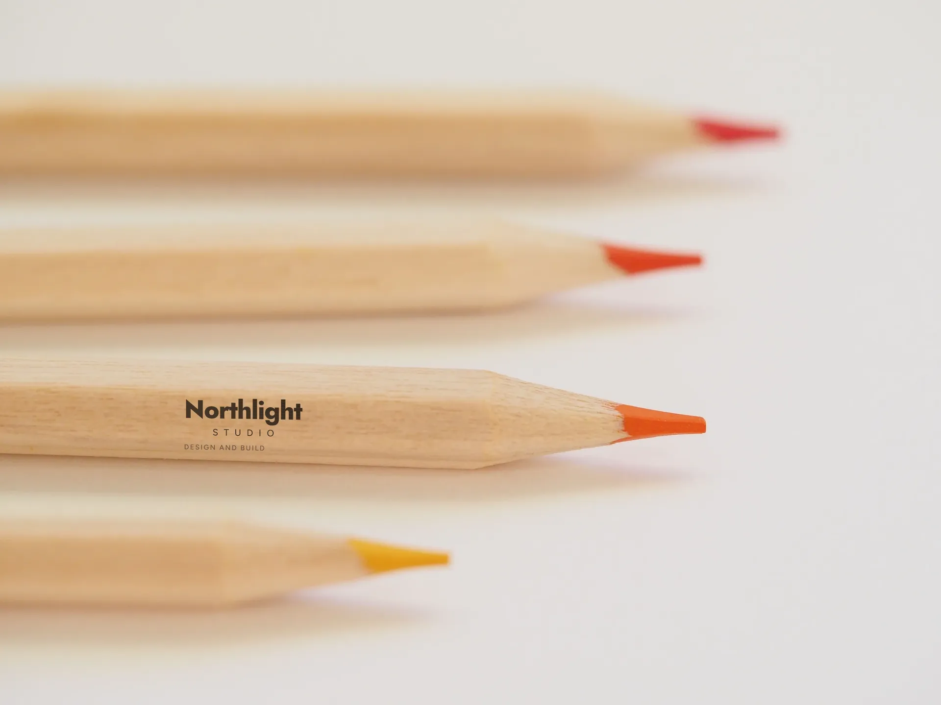 Northlight Studio logo on natural wood pencils
